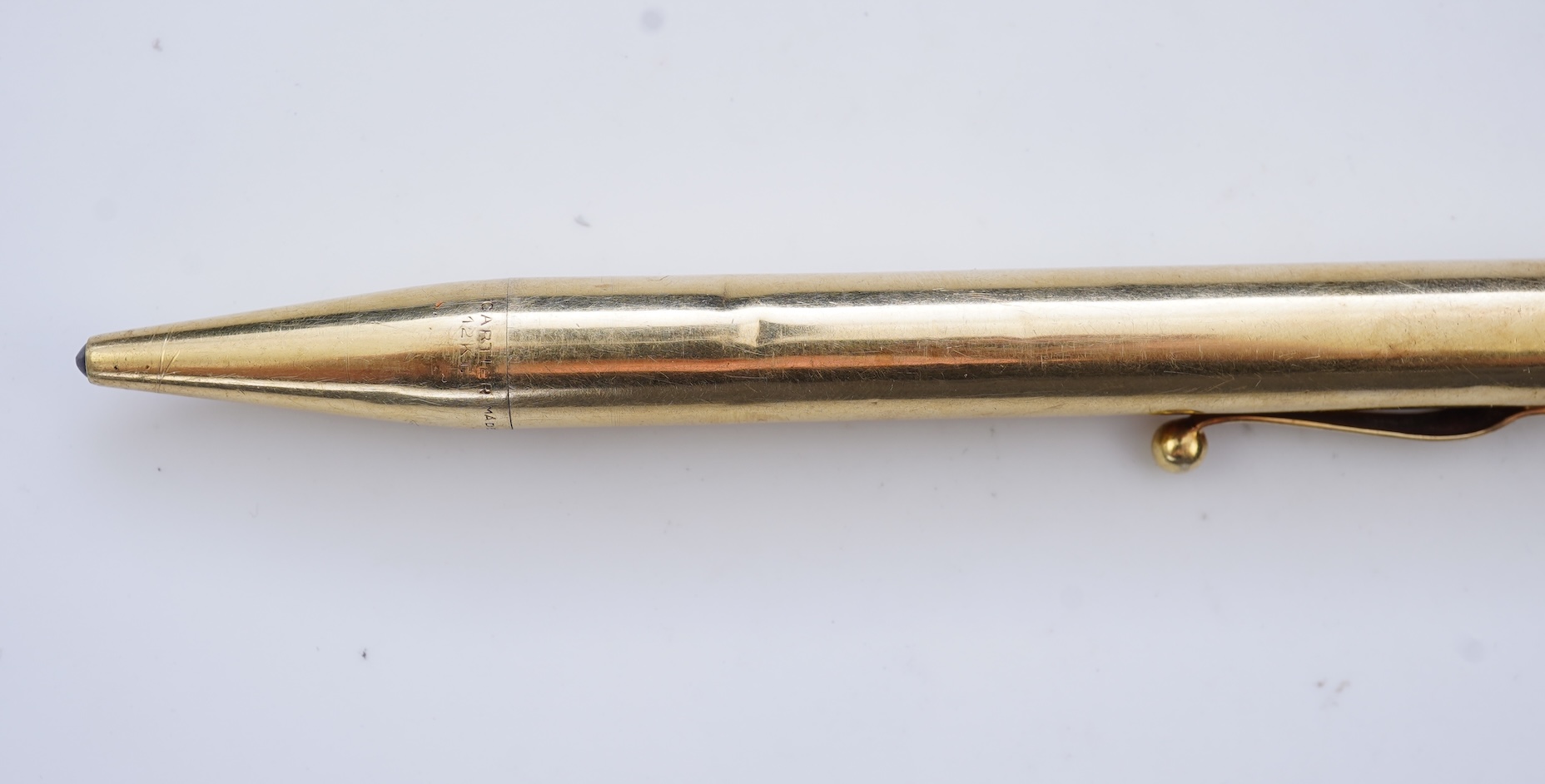 Cartier, a gold-cased propelling pencil/lighter, mid 20th century